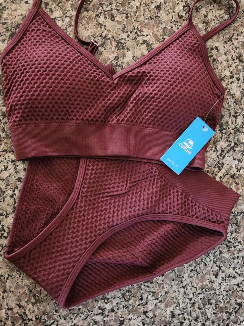 Brand new 2-piece swimsuit with tags